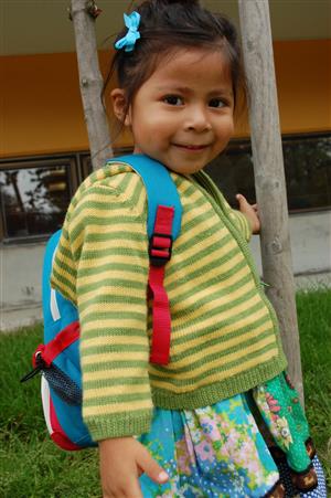 Preschool child wearing backpack